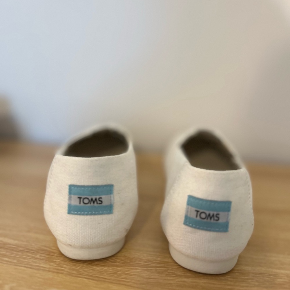TOMS white/creamish Canvas Slip-Ons